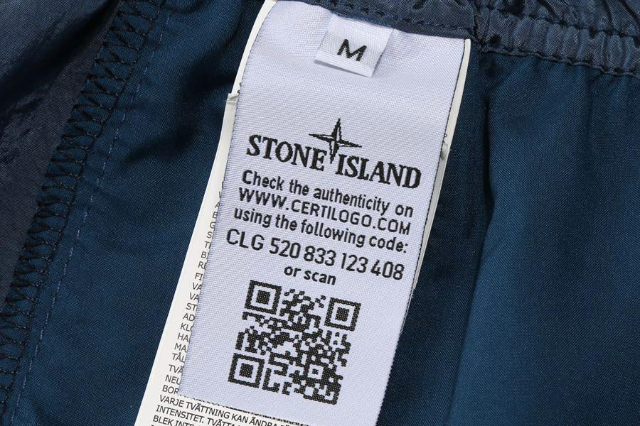 Calça Corta Vento Stone Island